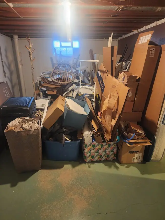 Roll-off dumpster container at job site for Yard Waste Dumpster Rental in Pomfret